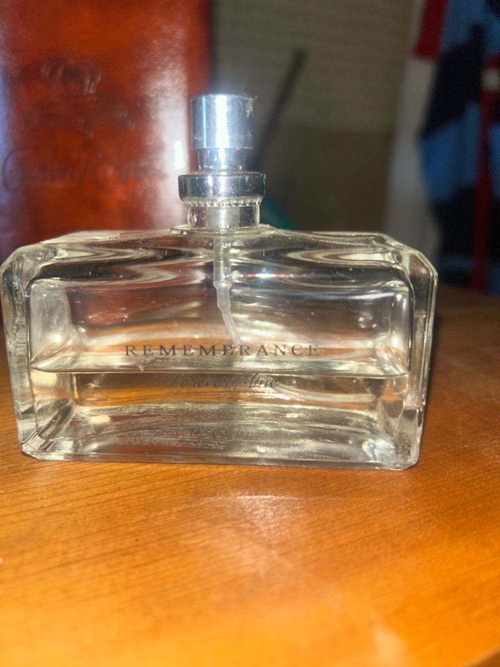 Ralph Lauren Remembrance Clear Glass Perfume Bottle with Light Amber Liquid